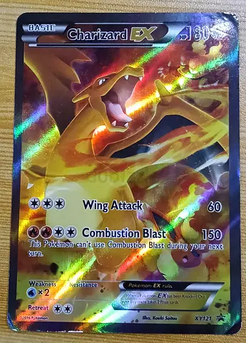 Rare Charizard EX Holo Pokémon Card (XY121) - Good Collectible Condition