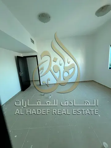 عيش الرفاهية على حدود دبي! غرفة وصالة ببرج فاخر في الممزر (التعاون)  وجيم ومسبح!
