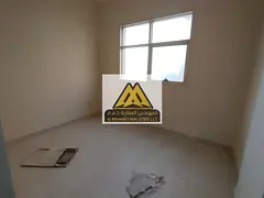 A 2-bedroom apartment with living room is available for annual rent in Al Jurf 2, Ajman, located in