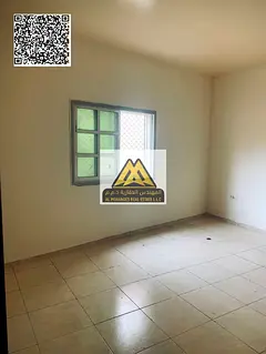 Two-bedroom apartment with a living room for rent in Al Nuaimiya 1, Ajman, at a special price after