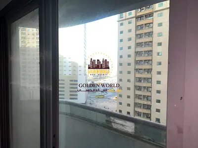 Two-bedroom apartment with a living room in Al Nahda, Sharjah, featuring a balcony with a pleasant view. Convenient location close to services. No par