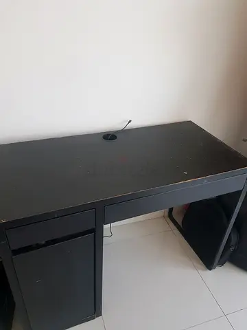 Black table with drawers