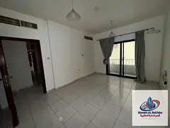 Two-bedroom apartment with a living room for annual rent in Al Qasimiya - Central air conditioning a
