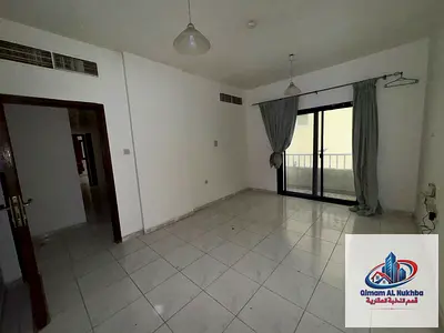 Two-bedroom apartment with a living room for annual rent in Al Qasimiya - Central air conditioning and gas - Spacious - Open view - Strategic location