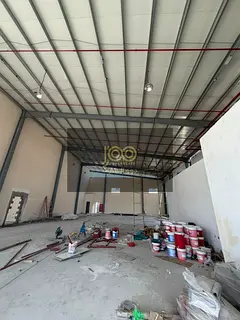 New warehouse, 13,000 sq ft, 150 kW electricity, corner location with setback in front of the wareho