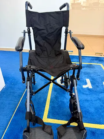 Lightweight folding pediatric transport wheelchair - good condition