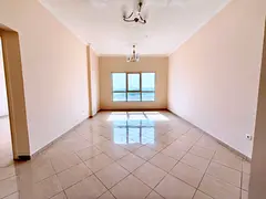 Spacious 2BHK with big hall and open view window close to road and school easy exit to dubai