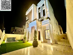 A distinctive villa for sale in Al Alia area - Ajman, with a modern design and spacious areas, suita