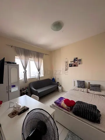Room available for monthly rent in Al Nahda, Sharjah, near a Dubai RTA bus stop.