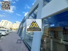 Distinctive commercial shops for annual rent in Al Jurf 2, Ajman, on a vibrant main road, suitable f