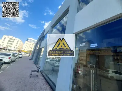 Distinctive commercial shops for annual rent in Al Jurf 2, Ajman, on a vibrant main road, suitable for all business activities, in a prime strategic l
