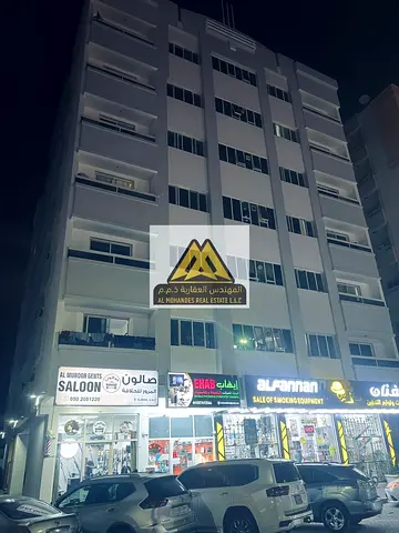 بناية للبيع – الراشدية، عجمان للبيع بناية تجارية وسكنية مكونة من أرضي + 6 طوابق على شارع رئيسي بموقع مميز في الراشدية.112