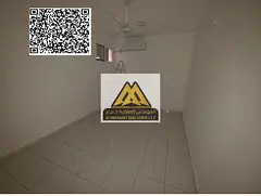 Studio apartment for rent in Al Rawda 2, Ajman, with a very large area, separate kitchen, and practi