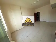 Special offer: Studio apartment for rent in Al Rawda 1, Ajman, with a large area, balcony, and open