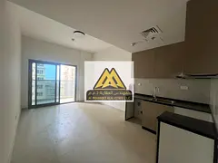 Studio apartment for annual rent in Al Aamra Residence Towers, Ajman. Spacious area with balcony, ki