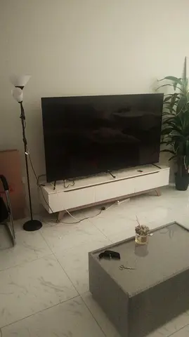 General Gold 75-inch LED TV in excellent condition with TV unit