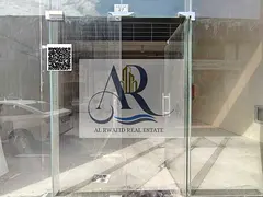 📢🔥 Showroom for Annual Rent – ​​Al Jurf Industrial Area 1 – Prime Location on a Main S