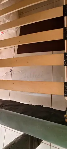 Queen bed with new and laminated mattress