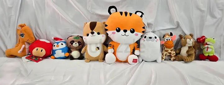 Lot of 10 Plush Stuffed Animals — Mixed Sizes, Good Condition