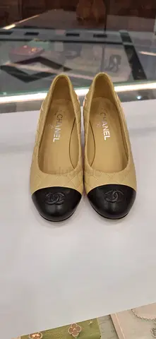 Beige Quilted Cap-Toe Ballerina Flats with Black Toe (Pre-owned)