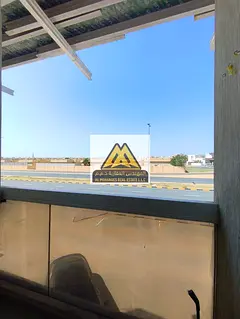 Ajman, located in Al Alia area on the main road, with a prime location close to Dubai and Sharjah ex