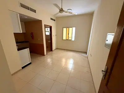 Al Hamidiya Studio, central air conditioning, maintenance by the owner, excellent location close to all services, easy access to Dubai and Sharjah