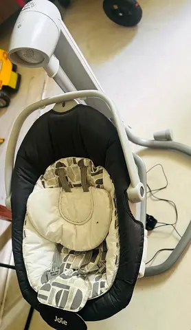Joie baby swing with gentle motions and music - good used condition