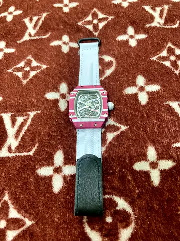 Richard Mille style pink skeleton watch with white strap