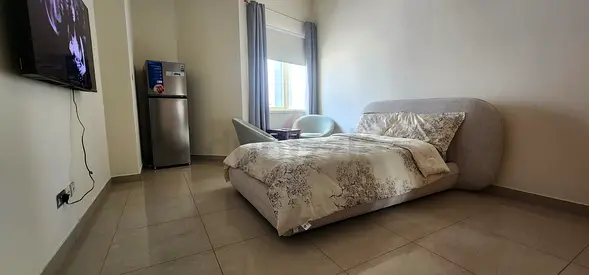 Its a private room with high end furniture and cable TV, high speed Internet, a spacious kitchen.