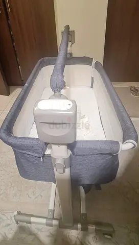 Bedside bassinet / cradle - adjustable height, good condition