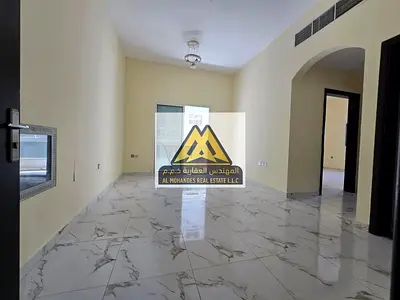 1BR master apartment in Al Jurf 2 Ajman, 2 baths, balcony, central AC, parking nearby, near Delta Center, AED 35K yearly, 4 payments.