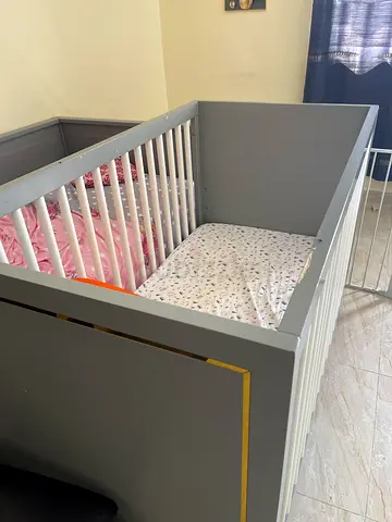 Grey wooden baby crib / cot in good condition