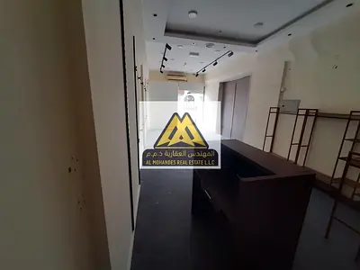 Commercial space for annual rent with mezzanine – Al Rawda 2, Ajman – Sheikh Ammar Street. Prime location and excellent space for commercial activitie