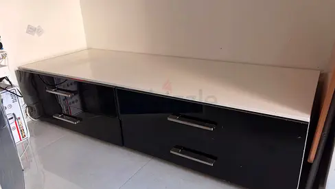 Low TV Entertainment Unit with Black Gloss Drawers and White Top
