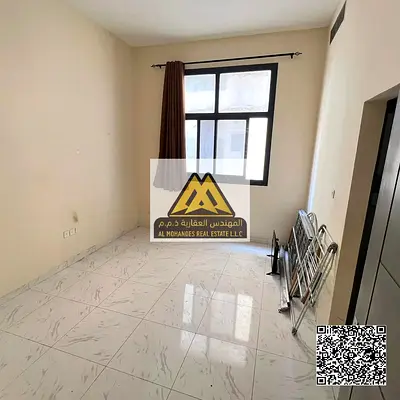 Studio apartment in Al Jurf 3, excellent location in a new and clean building, with a semi-separate kitchen and central air conditioning, close to all