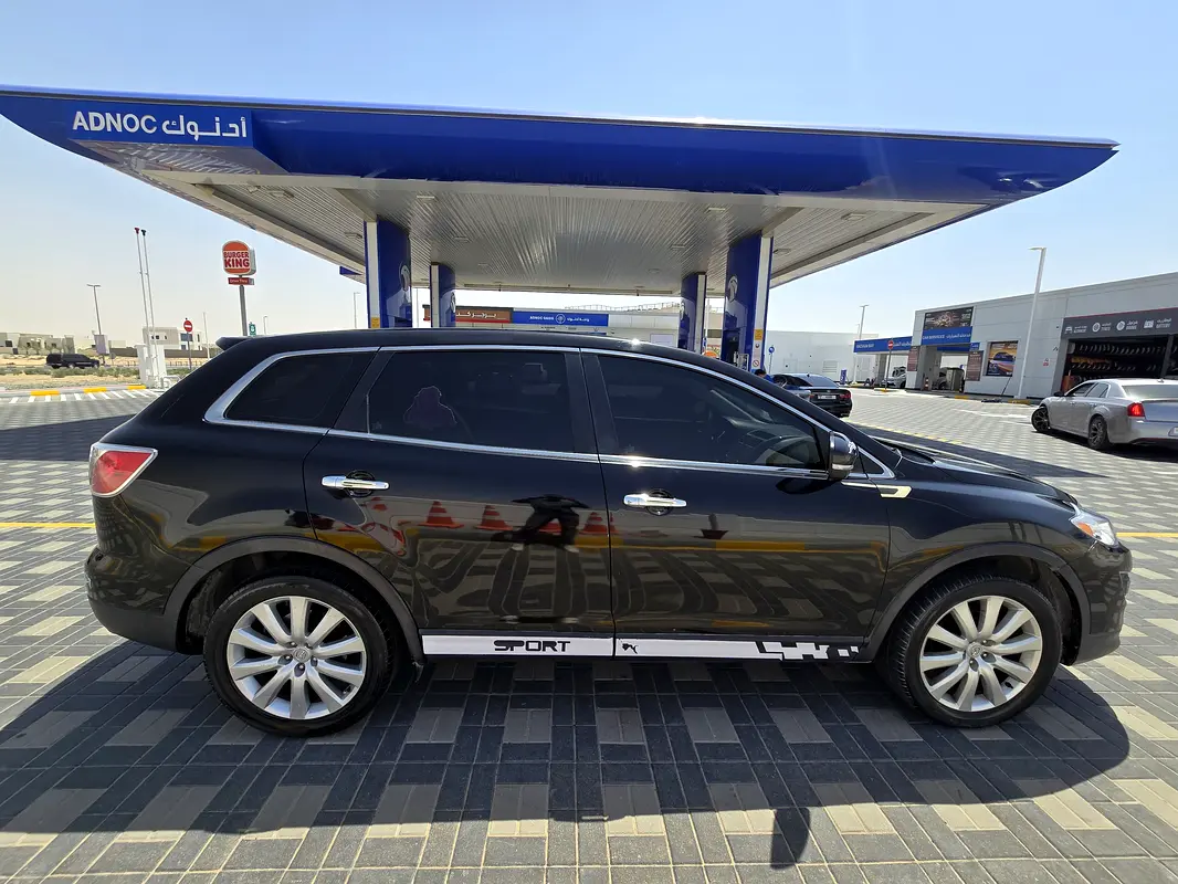 Mazda CX-9 2010 — photo 1 of 11