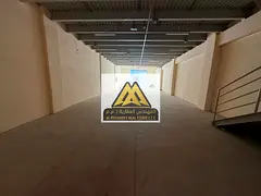 Large Commercial Shop with Mezzanine for Annual Rent – Al Jurf Industrial, Ajman | Total Area 3,82
