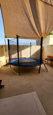 8ft Round Trampoline with Safety Net - Good Condition