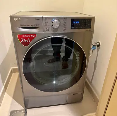 LG latest model washing machine 10.5 kg  wash and 7 kg dryer 2in1 almost new perfectly