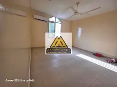 Spacious 2-bedroom apartment for rent in Al Rawda 3 Ajman on Sheikh Ammar Street, 2 bathrooms, 1,650