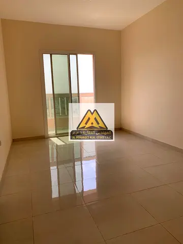 2-Bedroom Apartment for Annual Rent in Al Rawda 1, Ajman – Central AC and Balcony with Open View