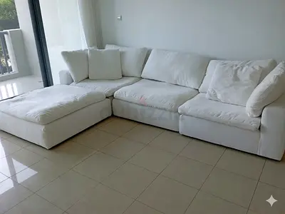 Marina Homes feather 🪶 filled modular sofa with ottoman neat and clean