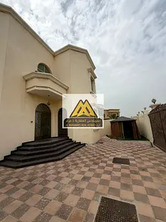 5 Bedroom Villa for Rent in Al Raqaib Ajman Majlis Living Room Maid Room Laundry Room Spacious Yard