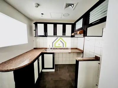 Specious Close kitchen 1BR | Parking + Wardrobe | New Muwaileh