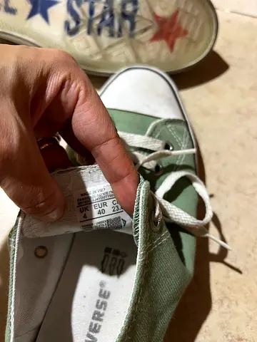 Used green low-top canvas sneakers (pair) - size not marked