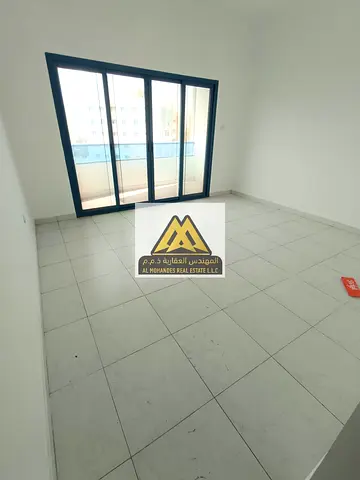 Annual rent spacious three bedroom apartment with living room in Falcon Towers Al Rashidiya 2 Ajman located in a prime area close to all services and