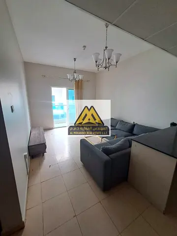 شقة غرفة وصالة للإيجار السنوي بأبراج السيتي تاور – عجمان | شامل باركن