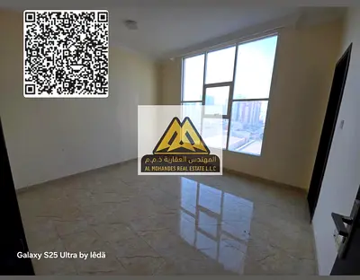 Annual rent apartment available in Al Nuaimiya 1, near the industrial area, featuring a prime location and open panoramic view with a spacious balcony