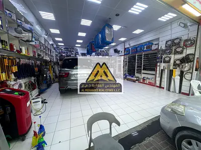 A large car accessories shop with an attached storage room.