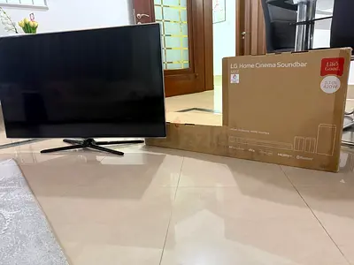 Samsung 42 inch used TV with Brand New LG Home Cinema Soundbar S55TR (soundbar speakers subwoofer)